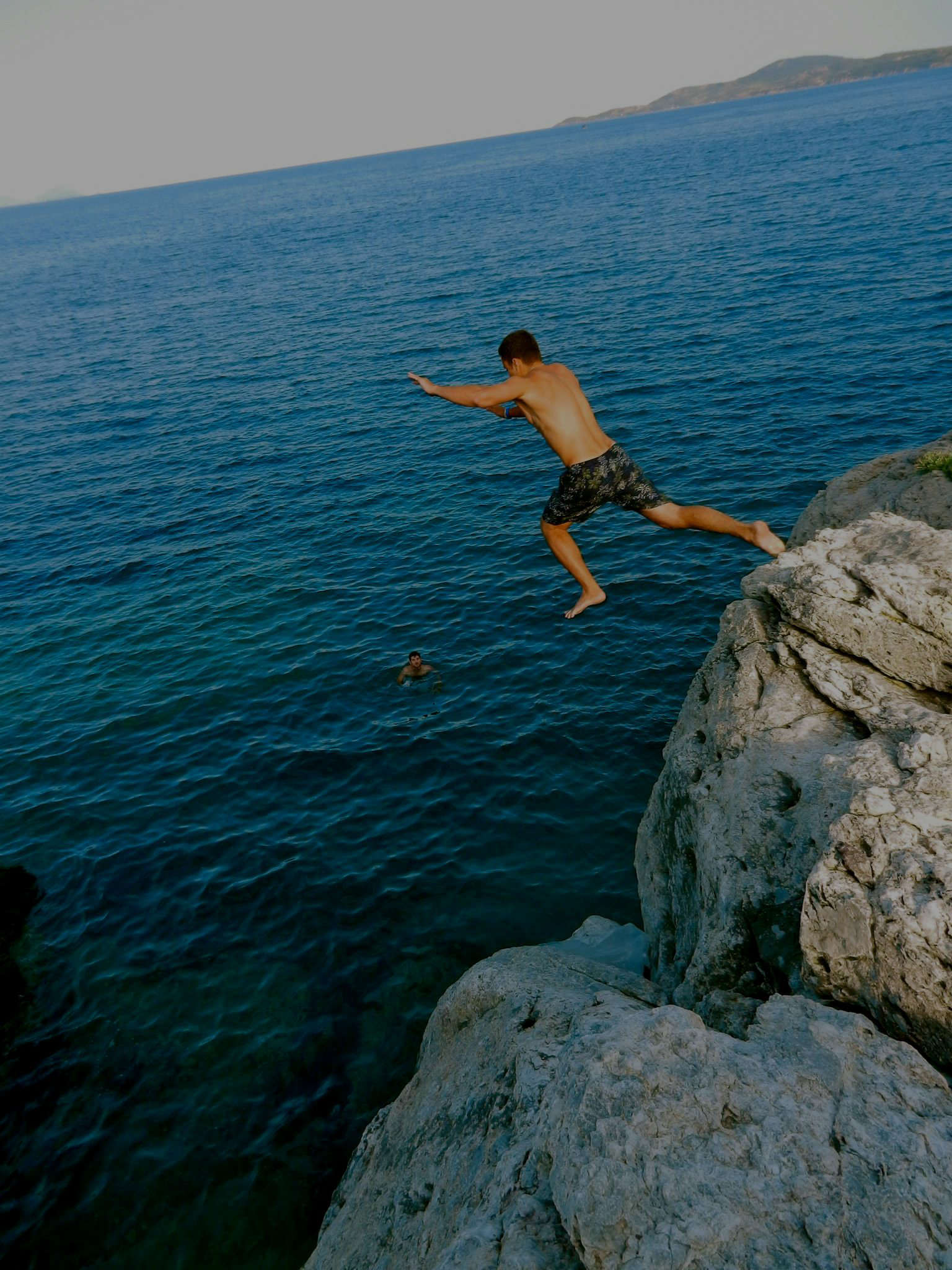 Elad Schor Jumping off a cliff in Greece